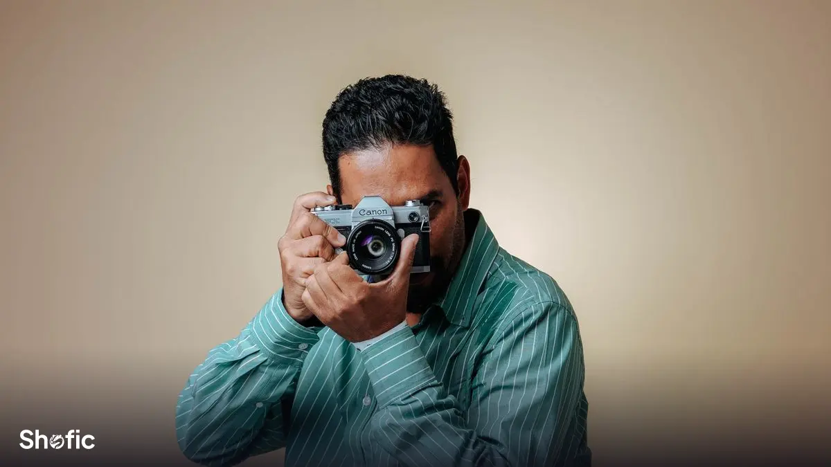 A portrait being photographed for a profile picture