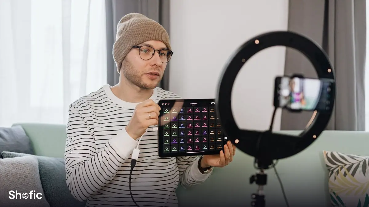 An influencer filming a product review at home