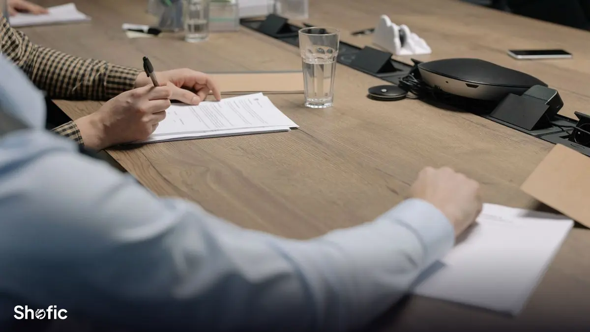 Signing a campaign agreement at a desk