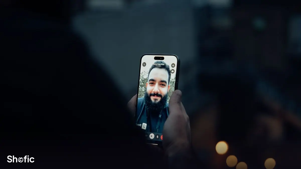 A person recording a vertical video with a phone for Snapchat