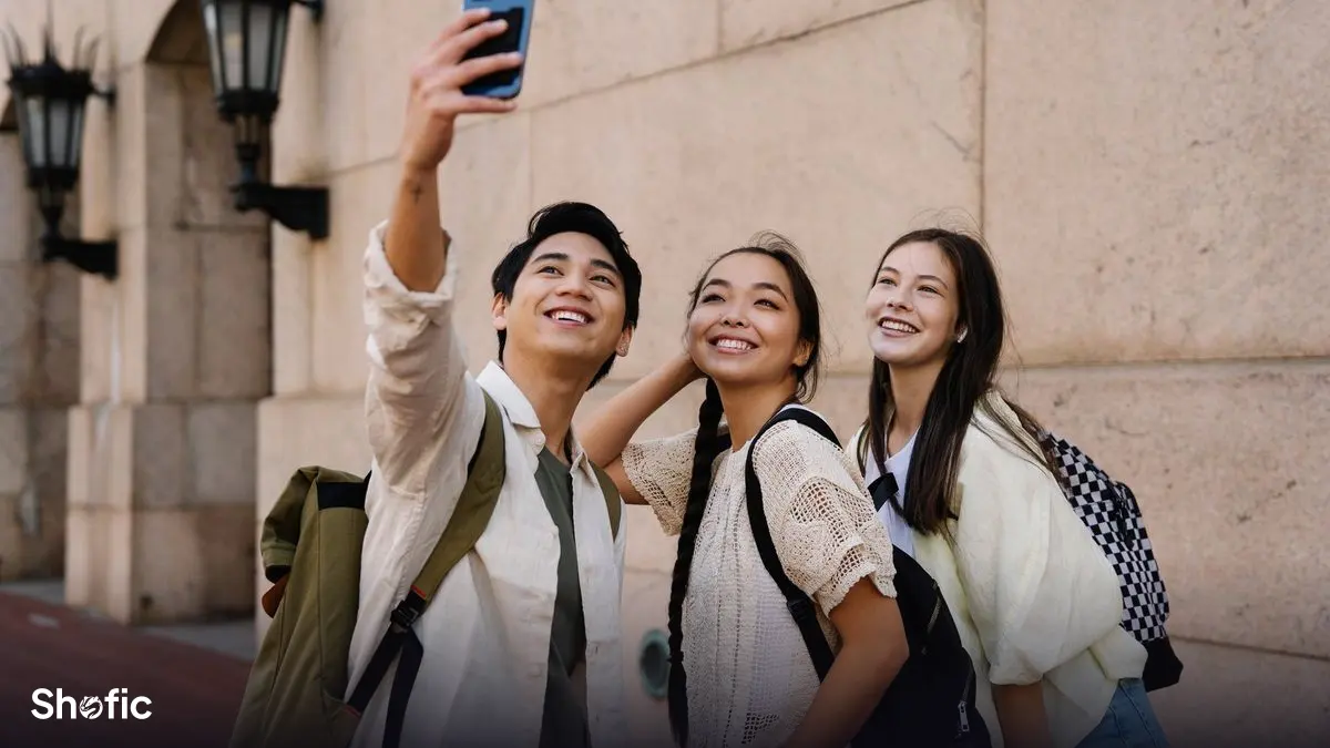Friends taking a photo together with a phone