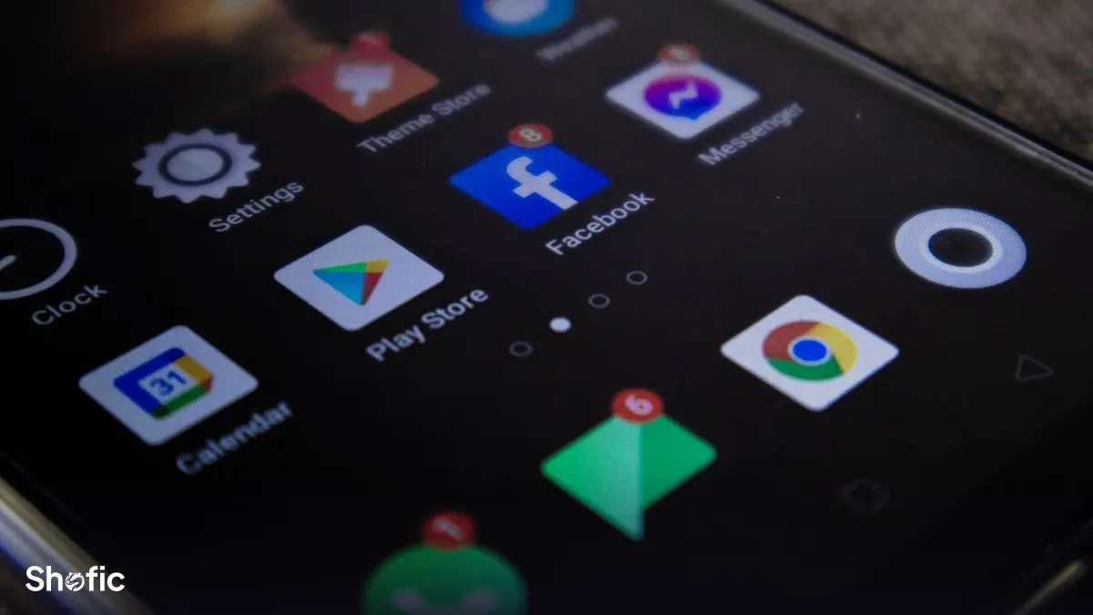 Close-up of social media apps on a phone screen