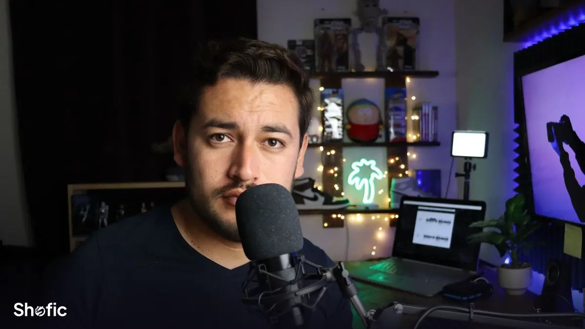 A creator recording a video with a camera and microphone