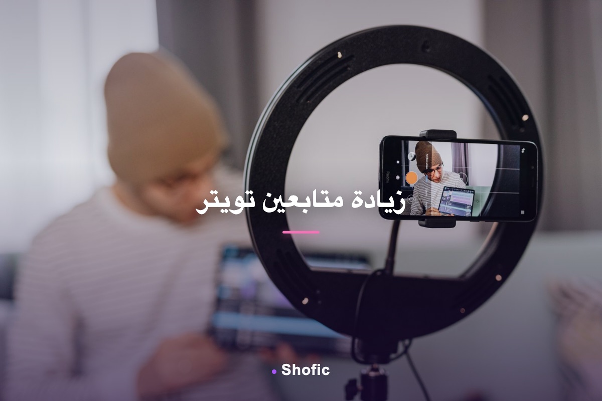 A creator holding a smartphone using a social app in the Gulf